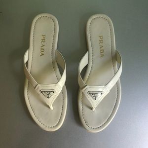 White Prada flip flops